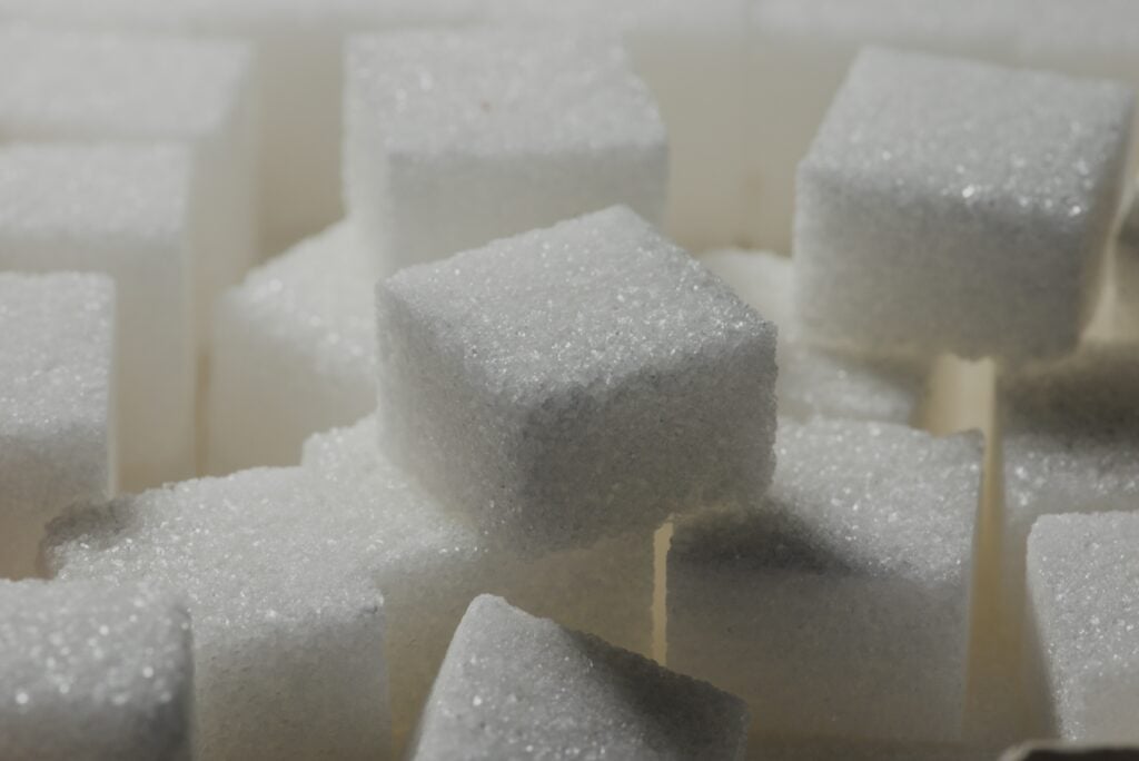 several sugar cubes in a pile